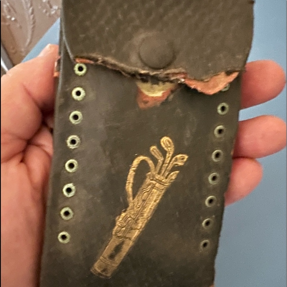 Antique 1901 golf card holder.